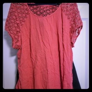 Coral colored blouse